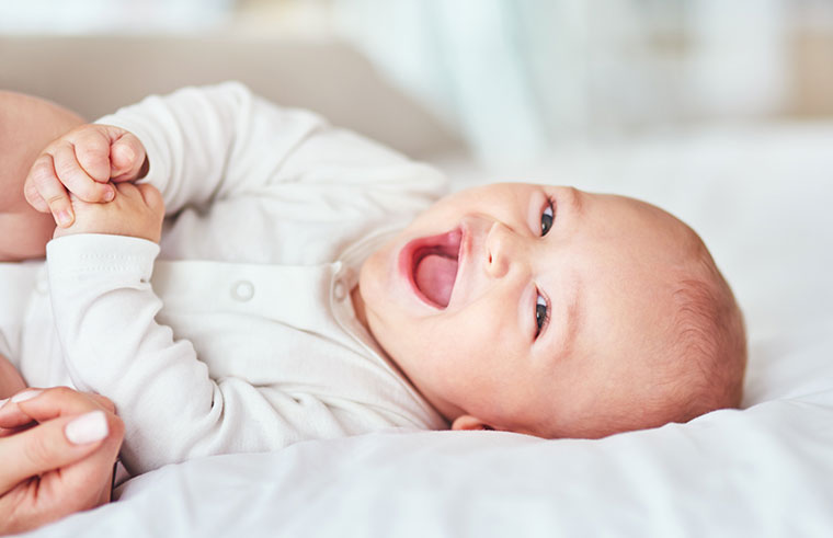 https://babyology.com.au/wp-content/uploads/2019/10/happy-laughing-baby.jpg