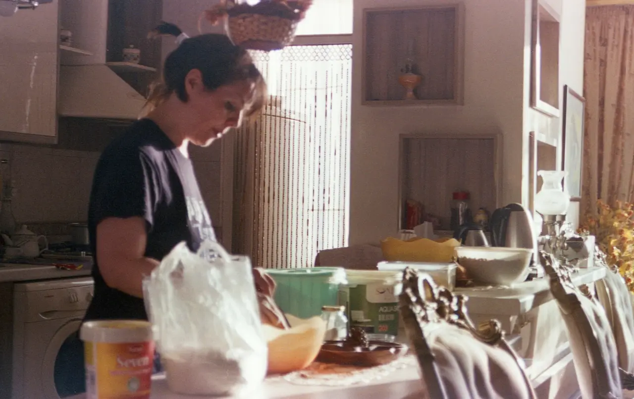 Woman Preparing a Meal in the Kitchen